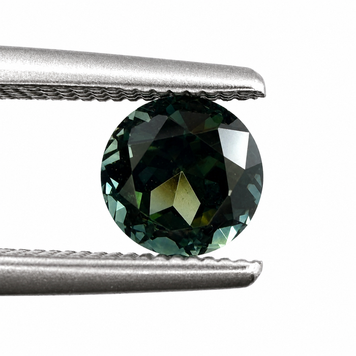 Australian Dark Teal sapphire 0.83 round brilliant cut loose gemstone - Buy loose or customise