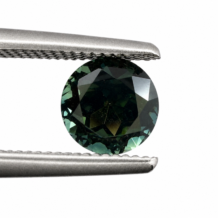 Australian Dark Teal sapphire 0.83 round brilliant cut loose gemstone - Buy loose or customise
