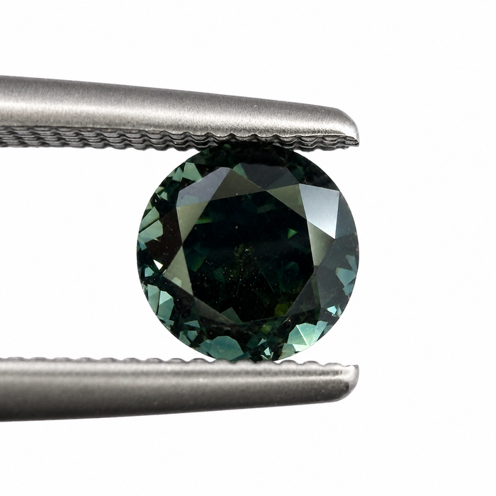 Australian Dark Teal sapphire 0.83 round brilliant cut loose gemstone - Buy loose or customise