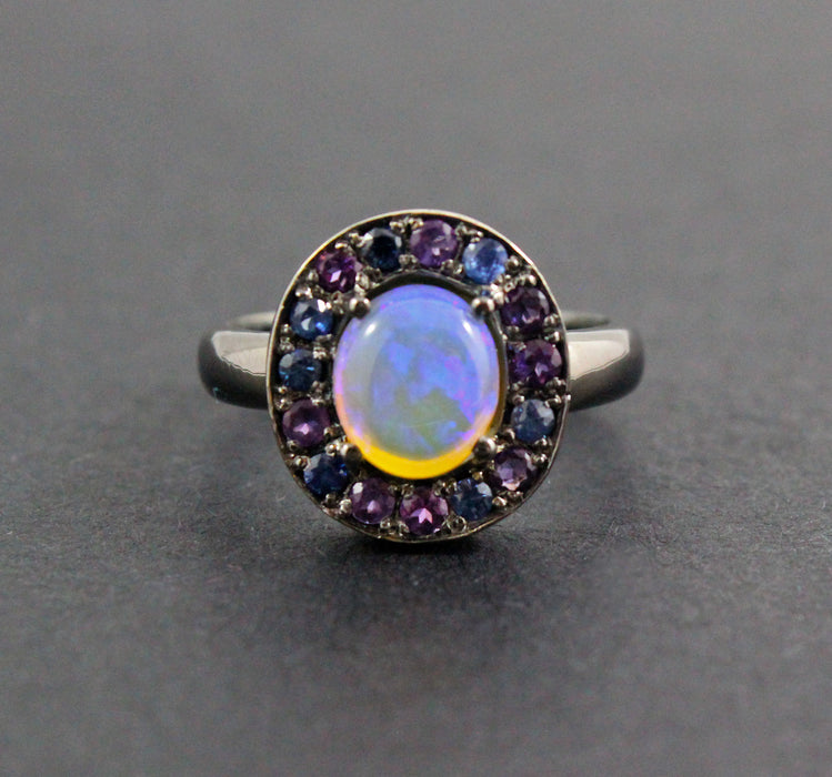 Australian jelly opal with amethyst and blue sapphire halo oxidized black gold ring