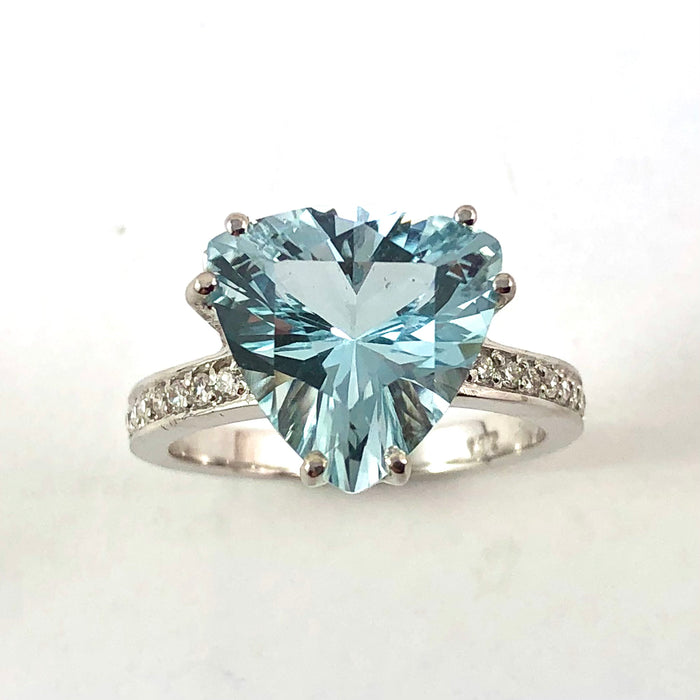 Natural untreated blue topaz trillion white gold and diamond ring