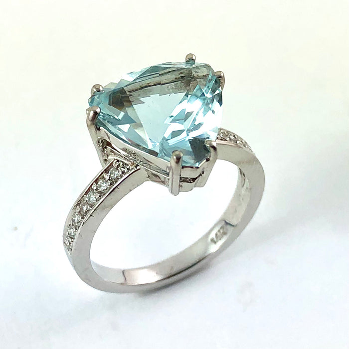 Natural untreated blue topaz trillion white gold and diamond ring