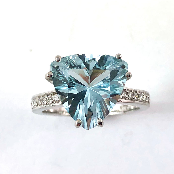 Natural untreated blue topaz trillion white gold and diamond ring