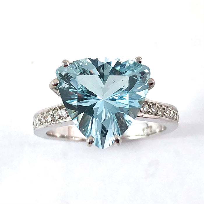 Natural untreated blue topaz trillion white gold and diamond ring