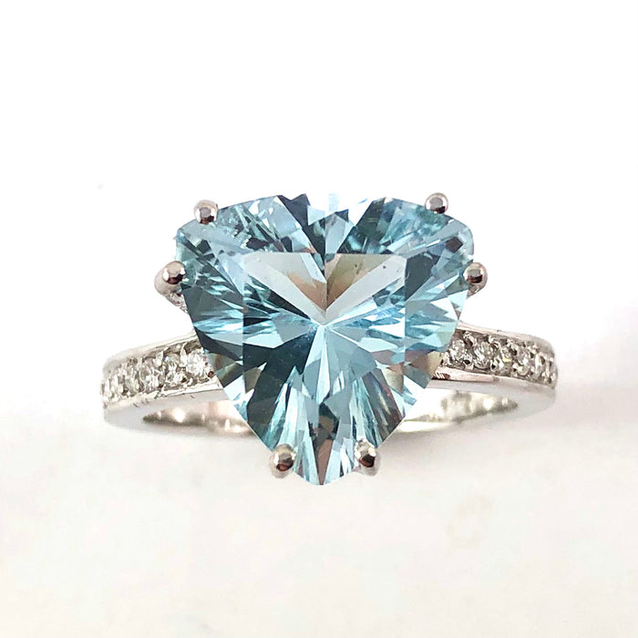 Natural untreated blue topaz trillion white gold and diamond ring