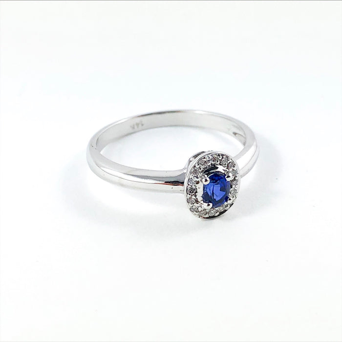 Ceylon sapphire oval and white diamond halo 14k white gold ring